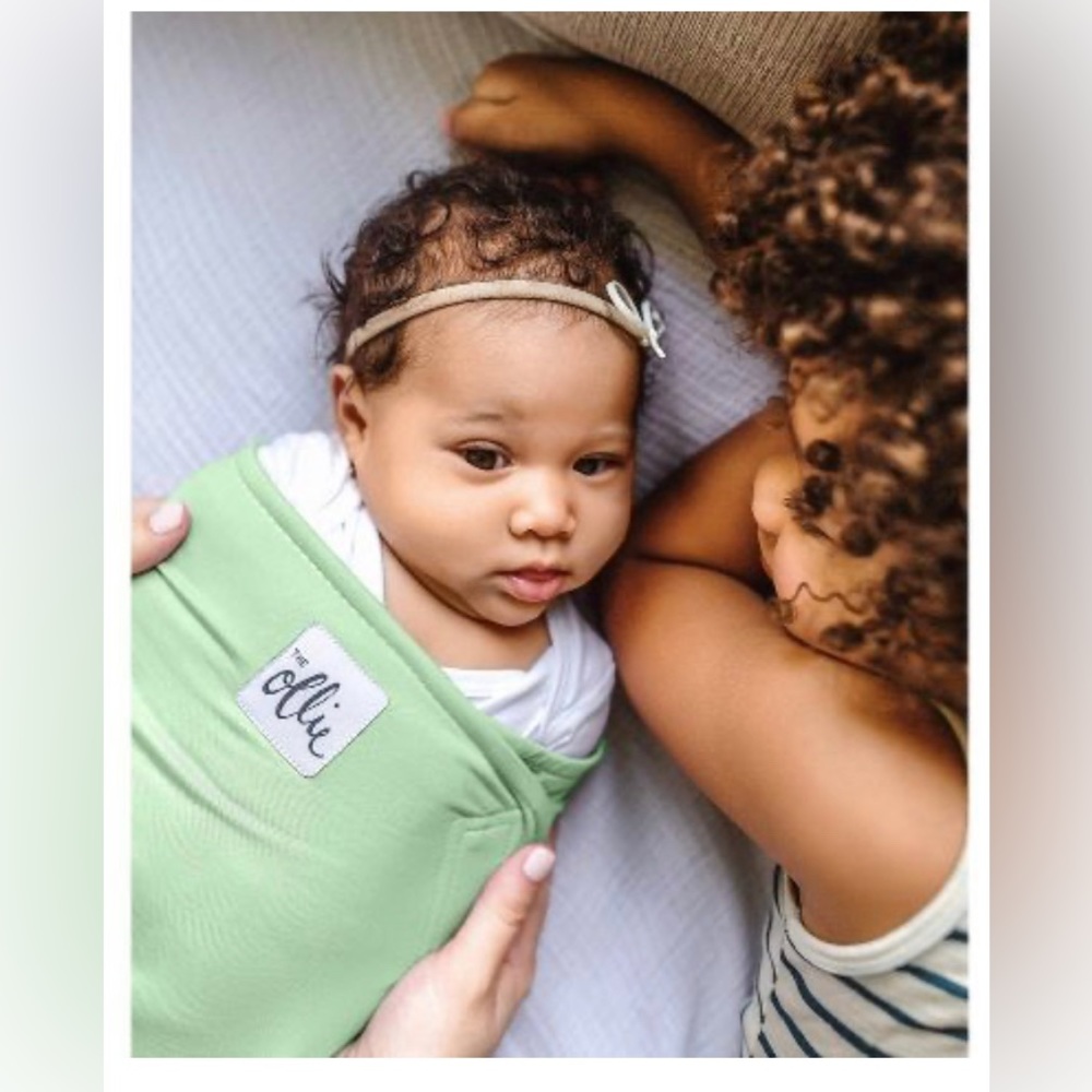 The Ollie World Swaddle in Meadow Green